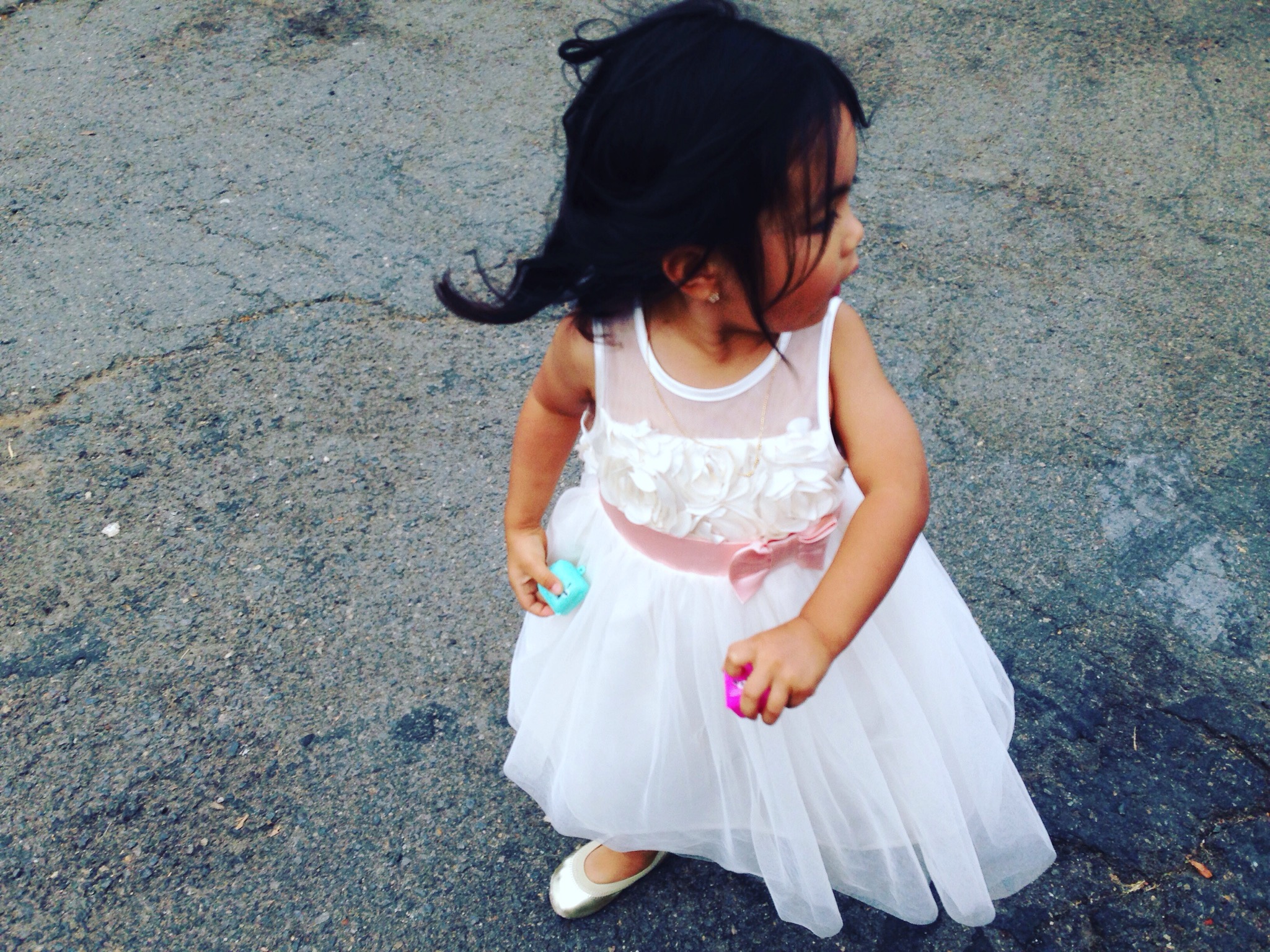 flower girl at wedding in oceanside, ca.