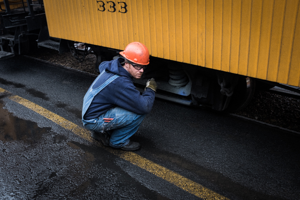 railroad worker with hardhat in durango, colorado. narrow gauge.