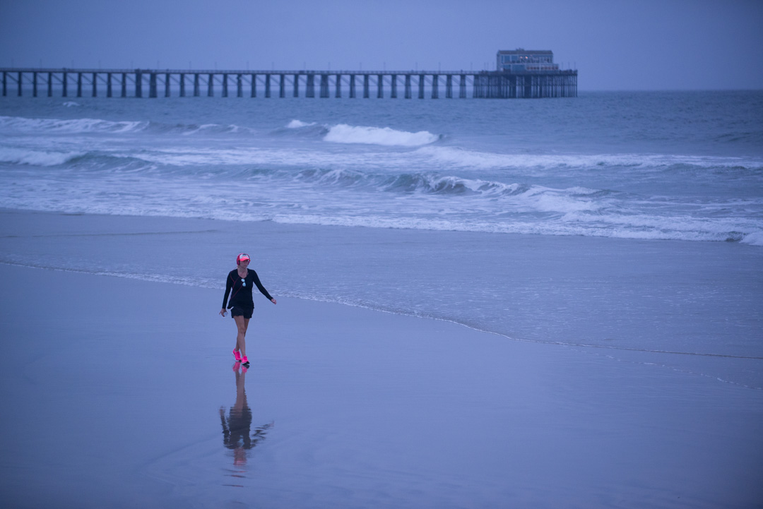 beach comber on oceanside beach. Oceanside, ca. early morning.