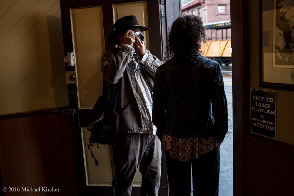 Durango, COolorado. At the train station, Jeremy Wade Shockley photographs Rachel Klein-Kircher.