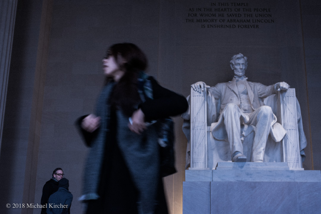 Tourists from all over come to see the statue of Abraham Lincoln on the National Mall in Washington DC.