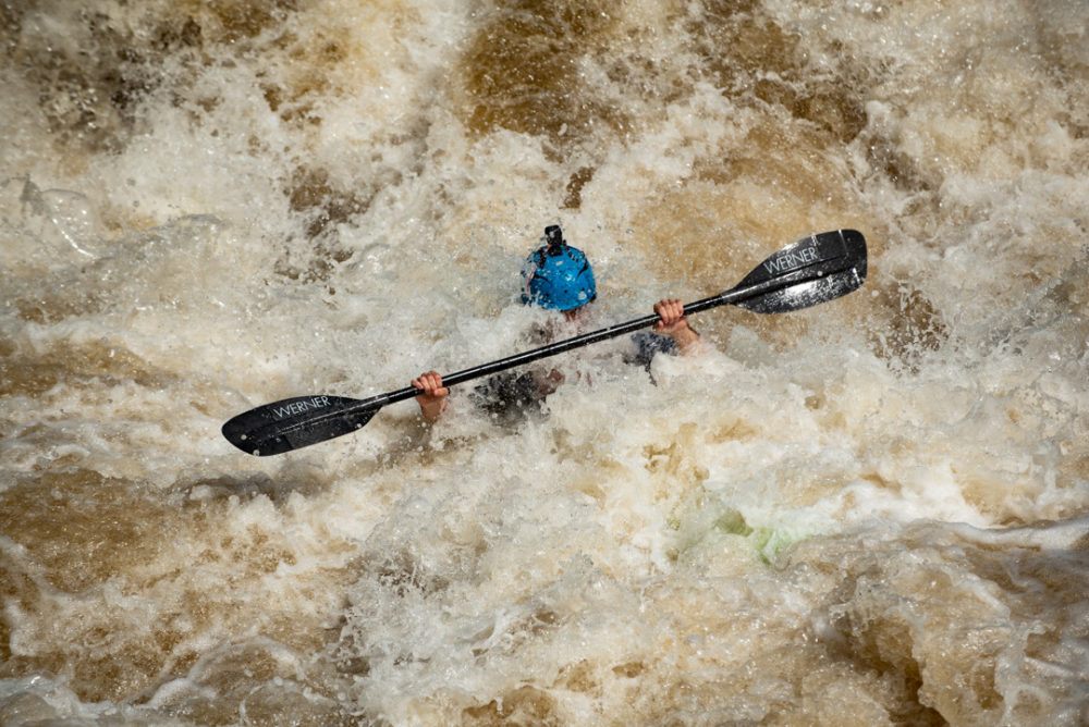 The Potomac River was too high for the race in 2018. It was moved to the first channel between the C&O Canal and Olmsted Island. Here, a kayaker trains the day before the race.